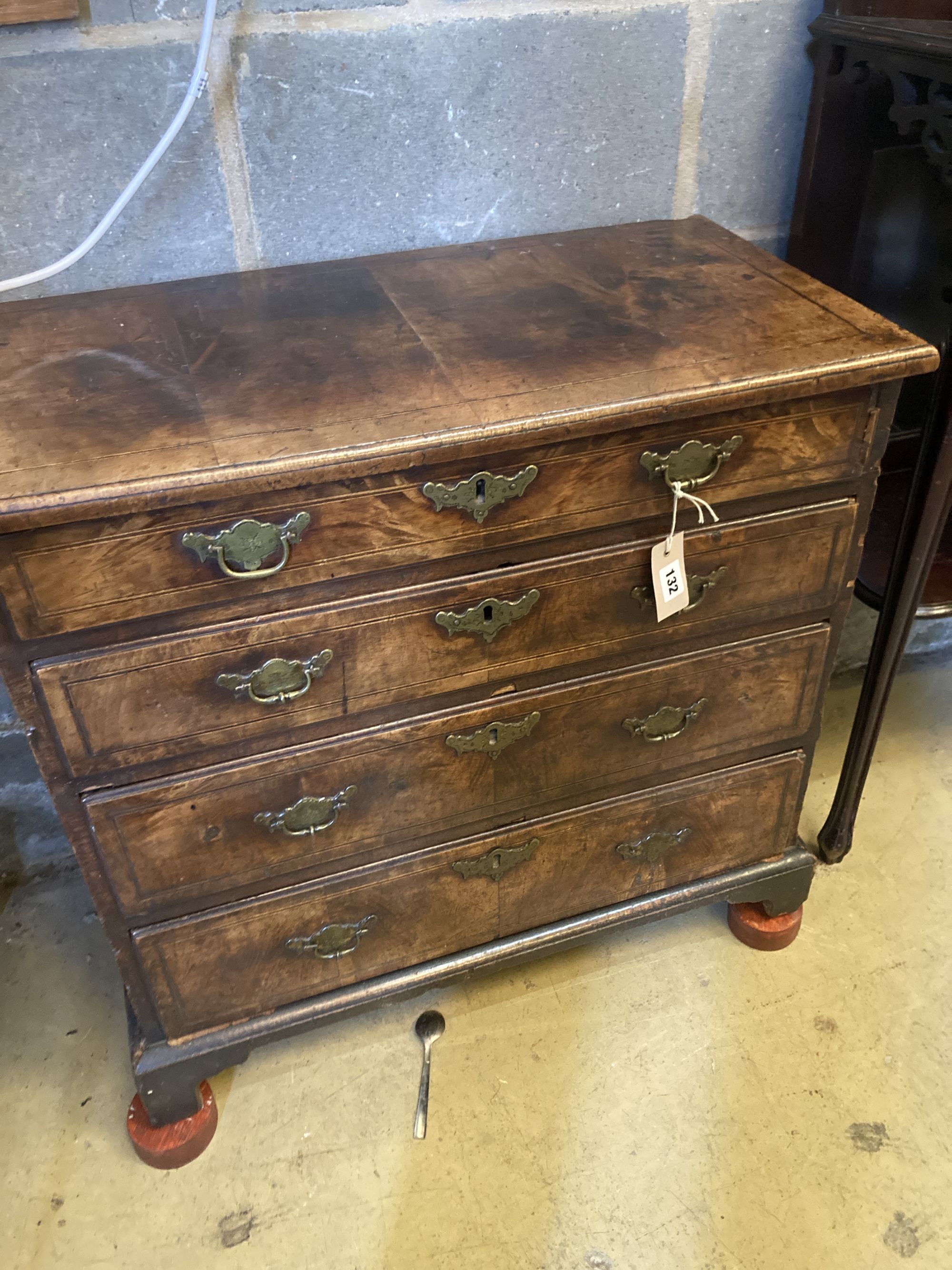 A small 18th century walnut chest of drawers, width 74cm, depth 39cm, height 73cm
